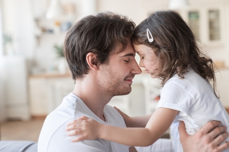 West Palm Beach father holding daughter, symbolizing protecting the parent-child bond during Florida DCF and custody cases.